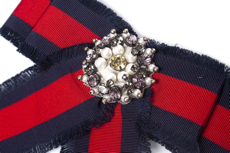 bow brooch gucci|gucci brooch price.